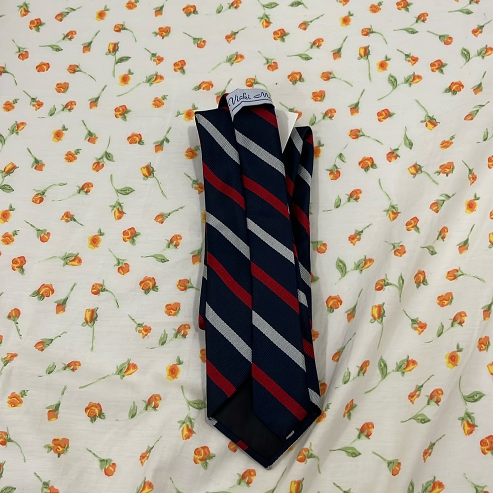 navy blue tie silver and red stripes.